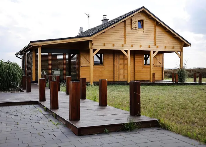 度假居 Caloroczny Tel 512-589-997 *